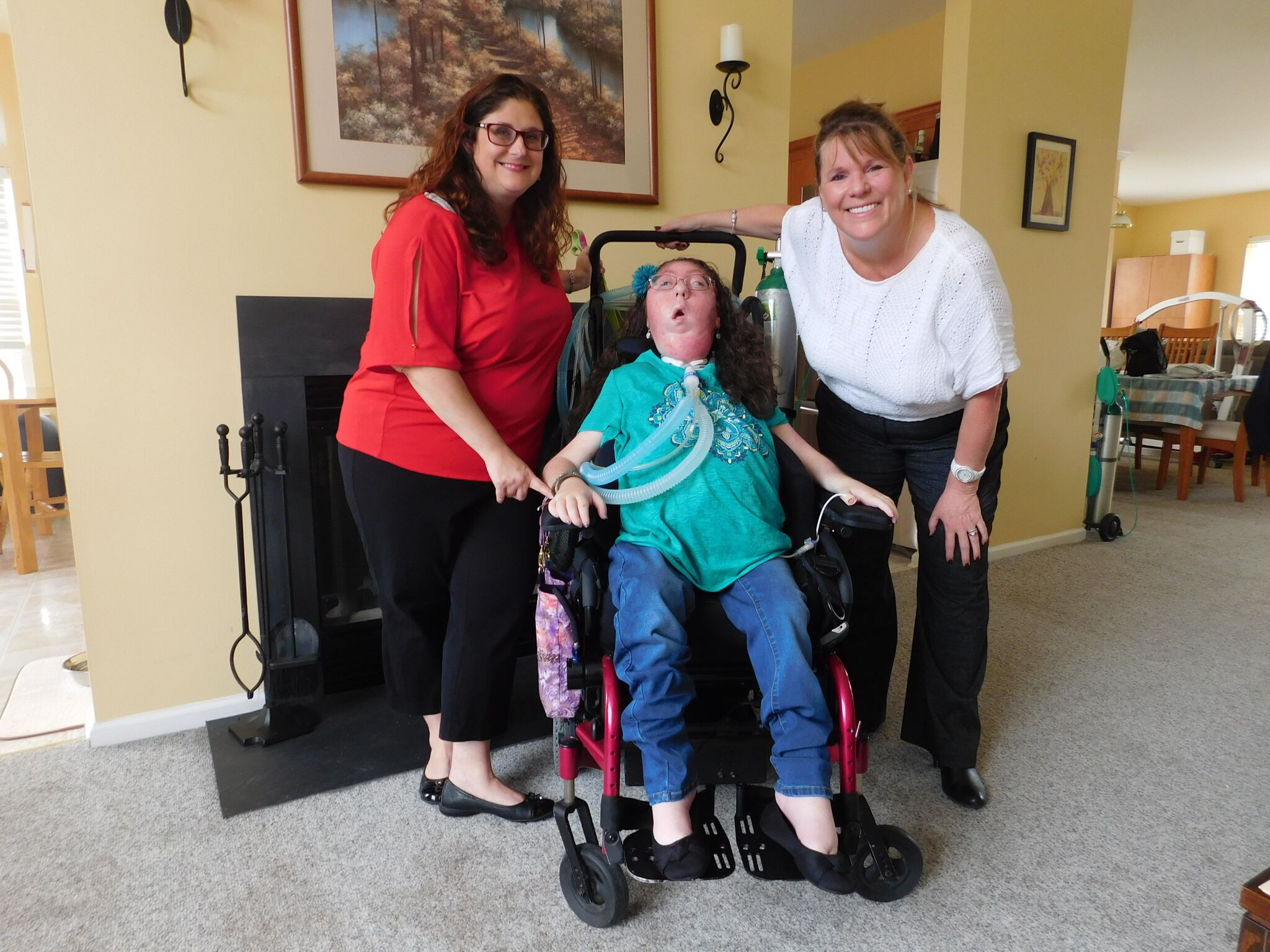 NJ Assemblywoman Carol Murphy with home care advocate Tara and daughter Mary, who has SMA